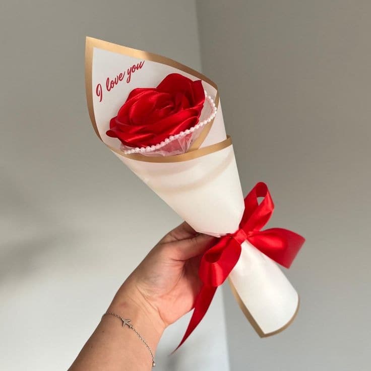 A single red rose, wrapped with love